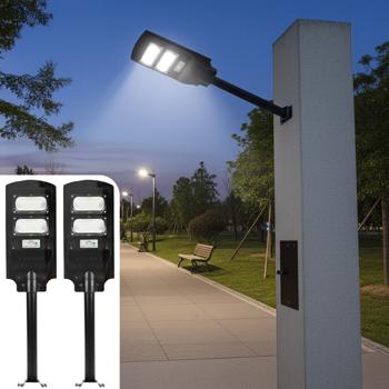 set of 2 LED solar street lights with light sensor & remote control, 100 watts, IP65, weatherproof outdoor lighting for driveway, yard & garden