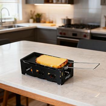 Preview: Raclette chauffe-bougie pliable pour 1 personne, set raclette sans électricité incl. bougies chauffe-plat et racloir, métal avec vaches découpées originales, revêtement antiadhésif