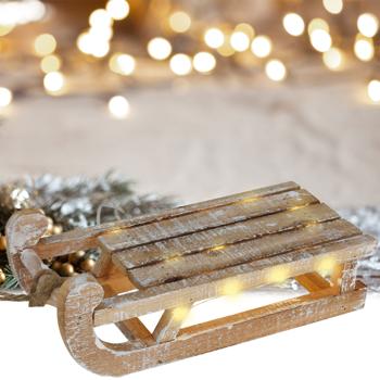 Dekorativer Rustikaler Leuchtschlitten aus Holz mit 25 warmweissen LEDs und Timer-Funktion. Für festliche Deko, Weihnachten & gemütliche Winterabende
