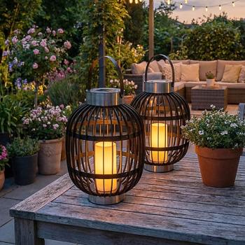 set of 2 stylish solar garden lanterns in rattan look: stainless steel rings, LED candle, 35x45cm, black - Decorative outdoor lighting