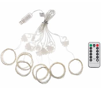 Preview: Élégant rideau lumineux LED 3 x 3 m, 300 LED blanc chaud : télécommande, 8 modes, intensité réglable, minuteur et connexion USB, idéal pour fêtes, mariages et décoration intérieure