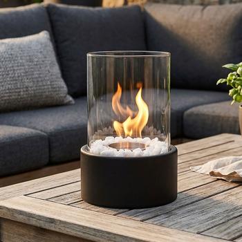 Preview: Elegant bio ethanol tabletop fire with glass cylinder, incl. flame snuffer & tongs – black steel table fireplace for indoor & outdoor use