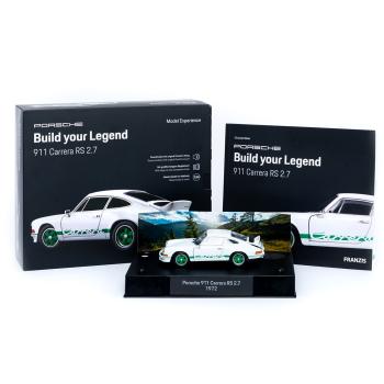 Preview: Adventskalender, Modellauto Porsche Carrera RS, Begleitbuch und zahlreiches Zubehör