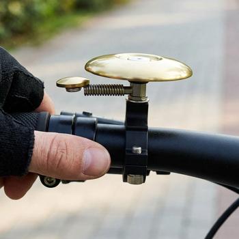 Preview: Compact bicycle bell – extra loud for safety in road traffic – Ø 4.8 cm – gold-coloured – quick mounting for any bike, flat velo bell