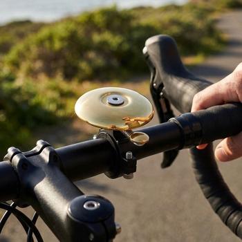 Preview: Compact bicycle bell – extra loud for safety in road traffic – Ø 4.8 cm – gold-coloured – quick mounting for any bike, flat velo bell