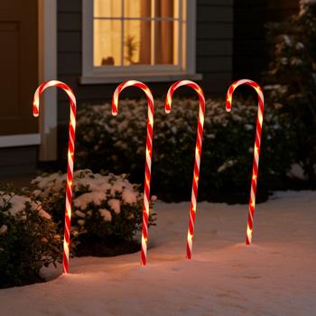 Preview: LED-Gartenstecker Zuckerstange 8er-Set - fröhliche Weihnachts-Gartendeko für Aussenbereich - Batteriebetrieben mit Timer - H 74 cm rot-weiss PP