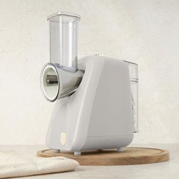 Preview: Râpe de cuisine électrique - Raboter, hacher, râper fruits, légumes, fromage - 5 inserts acier inoxydable, 150W, crème, silencieuse