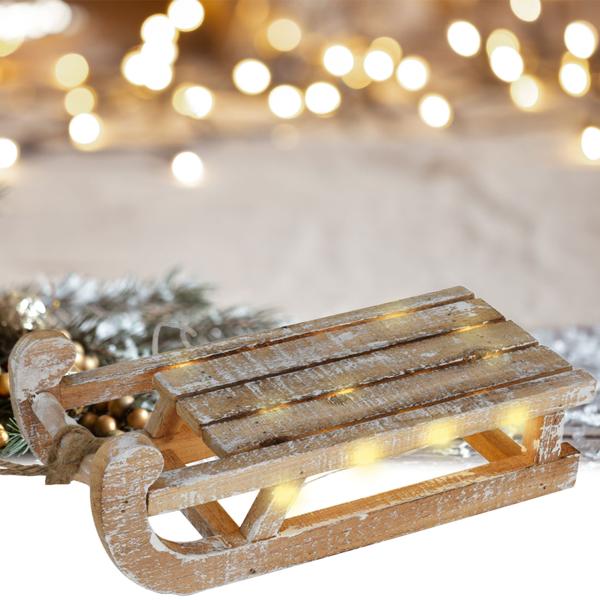 Decorative rustic illuminated sled made of wood with 25 warm white LEDs and timer function. For festive decor, Christmas & cozy winter evenings