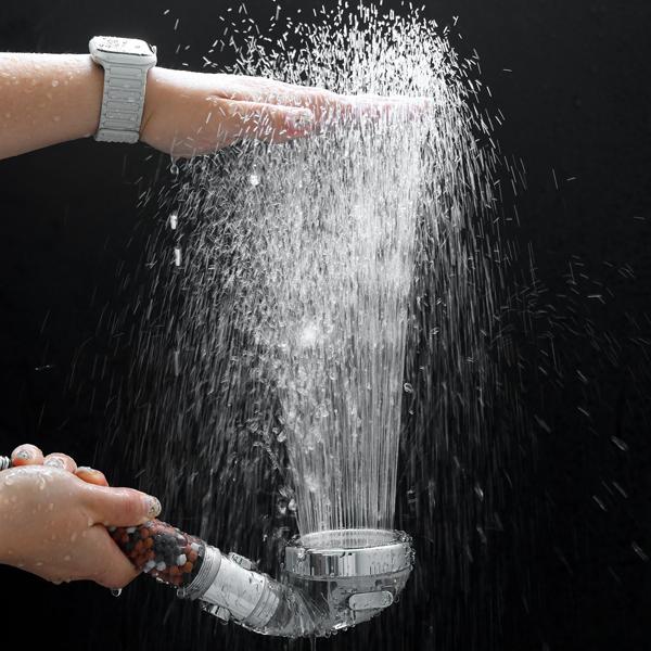 Innovative water-saving shower head with filter & 3 spray modes for reduced consumption & more enjoyment - with mineral stones for a luxurious shower experience