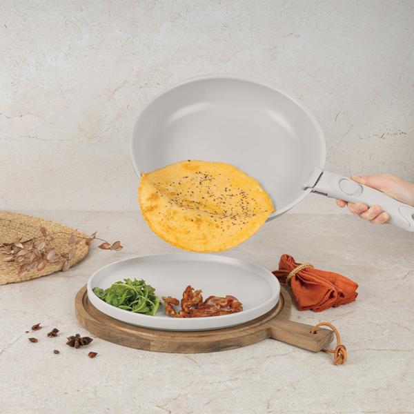 9-piece stackable cookware set with removable handle: non-stick, induction compatible, elegant matte cream design, robust