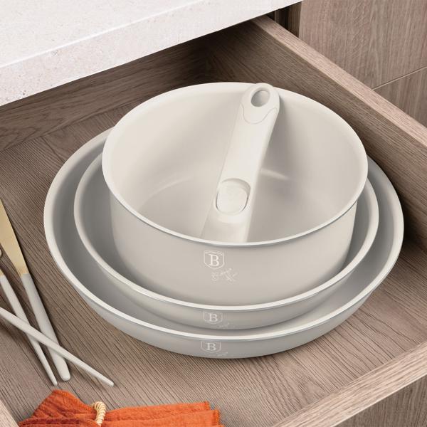 9-piece stackable cookware set with removable handle: non-stick, induction compatible, elegant matte cream design, robust