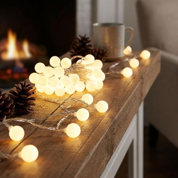 Energy-saving LED fairy lights: 80 warm white globes, 16m long, IP44 weatherproof - cozy outdoor lighting for atmospheric moments