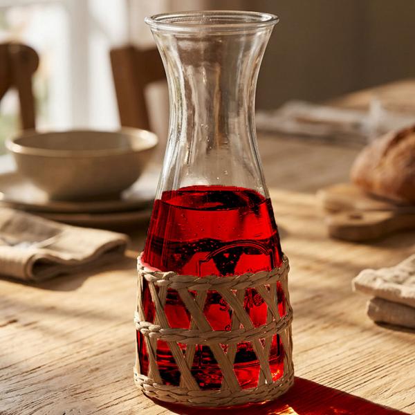 Glass carafe 1200 ml with rattan – stylish water carafe for refreshments – elegant glass carafe with natural rattan weave – perfect gift
