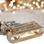 Decorative rustic illuminated sled made of wood with 25 warm white LEDs and t...