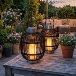 set of 2 stylish solar garden lanterns in rattan look: stainless steel rings,...