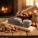 Innovative lever nutcracker in retro design: wooden plate with robust metal c...