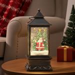 Decorative LED lantern with snow swirl, Santa Claus and Christmas tree